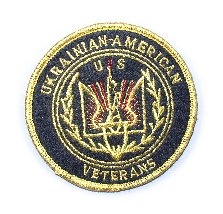 Round UUkrainian American Veterans (UAV) jacket emblem has UAV emblem embroidered in center with Ukrainian American Veterans written around perimeter