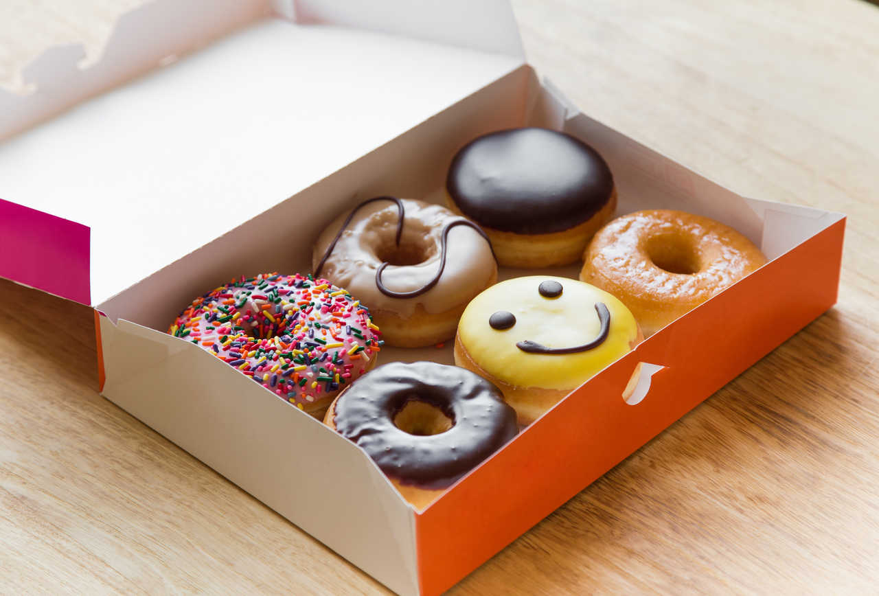 half dozen Dunkin donuts in a box